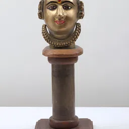 Exotic India Gold-Toned Brass Gauri Head on Wooden Pedestal Idol Showpiece-image-94