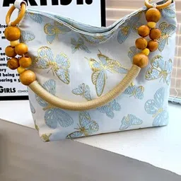 StyleCast Printed Structured Handheld Bag with Tasselled-picture-43