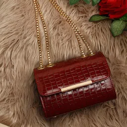 DressBerry Maroon Textured Structured Sling Bag with Fringed-31