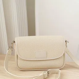 CORSICA Striped PU Bucket Sling Bag with Fringed-18