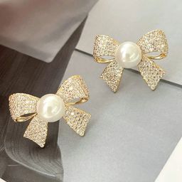 Celestria Contemporary Studs Earrings-36
