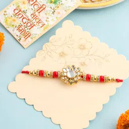 Anouk Kundan Studded Floral Design Thread Rakhi with Roli Chawal Chandan & Mishri-image-0