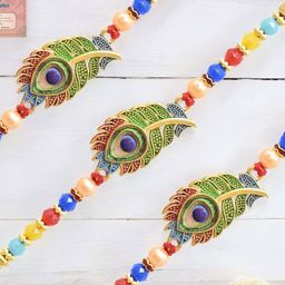 MEIRA JEWELLERY Set Of 3 Peacock Rakhis With Greeting Card & Roli Chawal-image-12