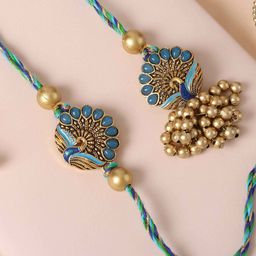 fnp Artificial Stones Studded And Beaded Vibrant Charm Bhaiya-Bhabhi Rakhi-picture-48