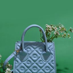 HAUTE SAUCE by  Campus Sutra Textured PU Structured Handheld Bag with Tasselled-image-86