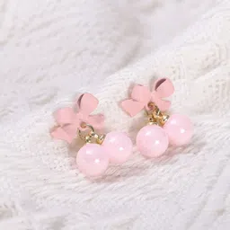VAGHBHATT Gold-Plated Pearls Studded Bow Shaped Studs image 4