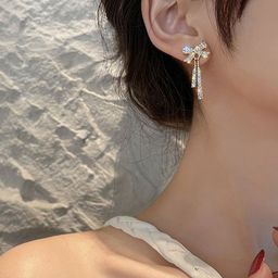 Celestria Bow Shaped Zircon Studded Drop Earrings image 5