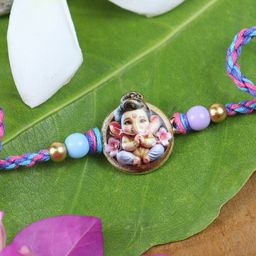 Asthetika Stones Studded Circular Shaped Wraparound Ganesha Thread Rakhi-54