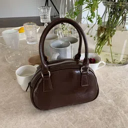 CORSICA PU Structured Handheld Bag with Tasselled-40