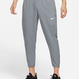 Nike Men Grey Dri-FIT Challenger Trackpants-image-46