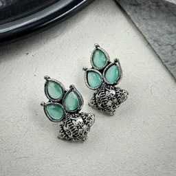 NAMAN ARTS Silver-Plated Artificial Stones Studded Floral Shaped Oxidised Drop Earrings-image-25