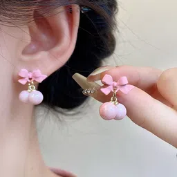 VAGHBHATT Gold-Plated Pearls Studded Bow Shaped Studs image 4
