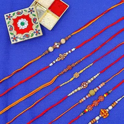 CRAYTON Set of 8 Beaded Thread Rakhis With Roli Chawal Holder-58