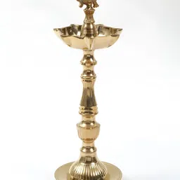 Exotic India Gold Toned Seven Wicks Peacock Oil Lamp-image-17
