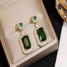 Yugosmile Gold-Plated Crystals Studded Contemporary Drop Earrings-image-93