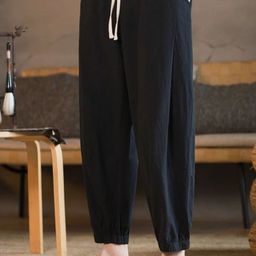 StyleCast x Revolte Men Solid Loose Fit Mid-Rise Flat-Front Regular Trousers-image-42