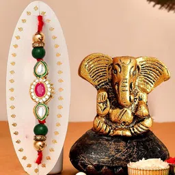 CraftVatika 5-Pcs Lord Ganesh Showpiece With Greeting Card & Roli Chawal Rakhi Gift Set-image-42