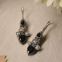 NAMAN ARTS Silver-Plated Artficial Stones Studded Oxidised Drop Earrings-image-41