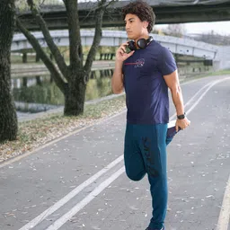 ASICS Men Teal Blue Brand Logo Printed Mid-Rise Slim Fit Big Graphic Regular Running Track Pants-image-13