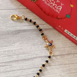 EL REGALO Kids Black Nazaria Rakhi Combo with Greeting Card & Roli Chawal Shagun-38