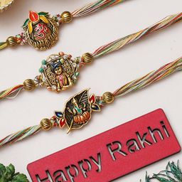 eCraftIndia Set of 3 Lord Ganesha, Lord Krishna & Om Symbol Rakhis with Roli & Chawal-image-0