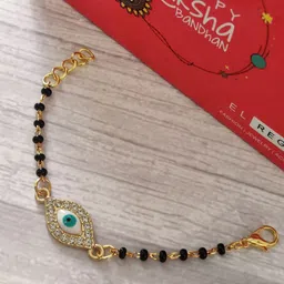 EL REGALO Kids Gold-Toned Nazaria Rakhi Combo with Greeting Card & Roli Chawal Shagun-image-60