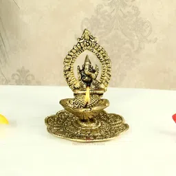 HANDICRAFTS PARADISE Gold Toned Lord Ganesh & Flower Designed Antique Metal Pooja Diya-image-59