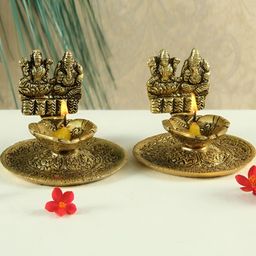 HANDICRAFTS PARADISE Gold Toned 2 Pcs Lakshmi Ganesh Designed Antique Metal Pooja Diyas-image-56