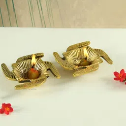 HANDICRAFTS PARADISE Gold Toned 2 Pcs Beige Swastik Designed Antique Metal Pooja Diyas-image-55
