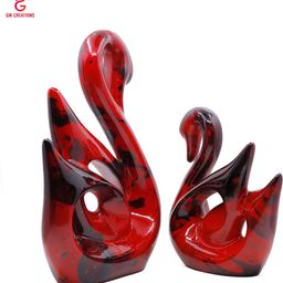 GW CREATIONS Red Figurine Showpiece-image-60