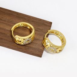 MYKI Gold-Plated American Diamond-Studded Contemporary Studs Earrings-17