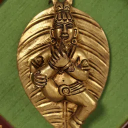 PujaNPujari Gold-Toned Krishna On Leaf Idol Showpiece-image-44