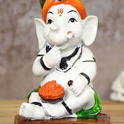 eCraftIndia White & Orange-Colored Lord Ganesha Eating Ladoo In Lord Krishna Avatar Decorative Showpiece-image-14