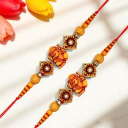 ADIVA 4-Pcs Stone Studded & Beaded Lord Ganesha Rakhi With Pooja Thali & Roli Chawal Bag-image-35