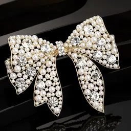 PANASH Women Gold-Toned & White Embellished Bow-Shaped Alligator Hair Clip-17