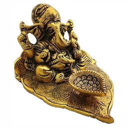 Navyaksh Gold Toned Lord Ganesha With Diya Religious Idol Showpiece-image-93