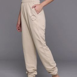 Women Solid Beige Track Pants-image-79