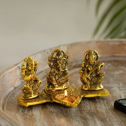 ExclusiveLane Gold Toned Laxmi Ganesh & Saraswati Idol & Diya Decorative Figurines-image-71