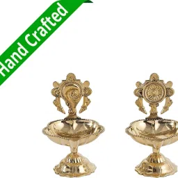 Brass oil lamp with Shanku-Chakra, reflecting Indian pooja heritage. Brass (Pack of 2) Table Diya Set-picture-0