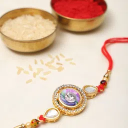 Exotic India Stone Studded Round Shape Rakhi with Sacred Thread-image-22