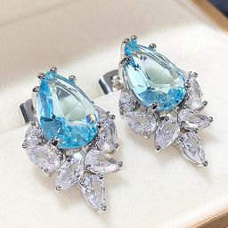 Designs & You Silver Plated American Diamond Studded Teardrop Shaped Studs-image-85
