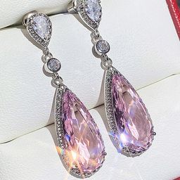 Designs & You Silver-Plated American Diamond Studded Teardrop Shaped Drop Earrings-42