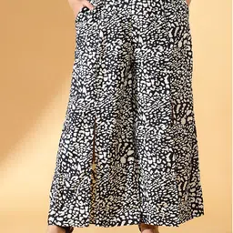 CURVE BY KASSUALLY Women Black & White Animal Printed Flared Parallel Trousers-88