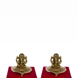 INTERNATIONAL GIFT Gold Toned Ganesha Sitting On Leaf Idol With Diya & Box-image-41