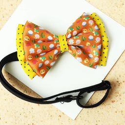 Tossido Girls Orange & Yellow Printed Layered Bow With Adjustable Elastic Hairband-36