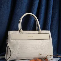 Accessorize London Women Faux Leather Ivory Beetel Croc Handheld Bag-41