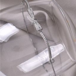 JOKER & WITCH Women Silver-Toned Bow Charm Bracelet-52