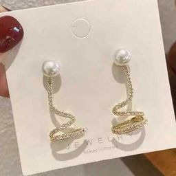 VAGHBHATT Gold-Plated Twisted Shining Studs Earrings image 3