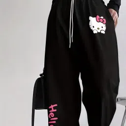 Women Self Design Black Track Pants-image-0