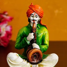 eCraftIndia Green & White Rajasthani Man Playing Musical Instrument Showpiece-image-17